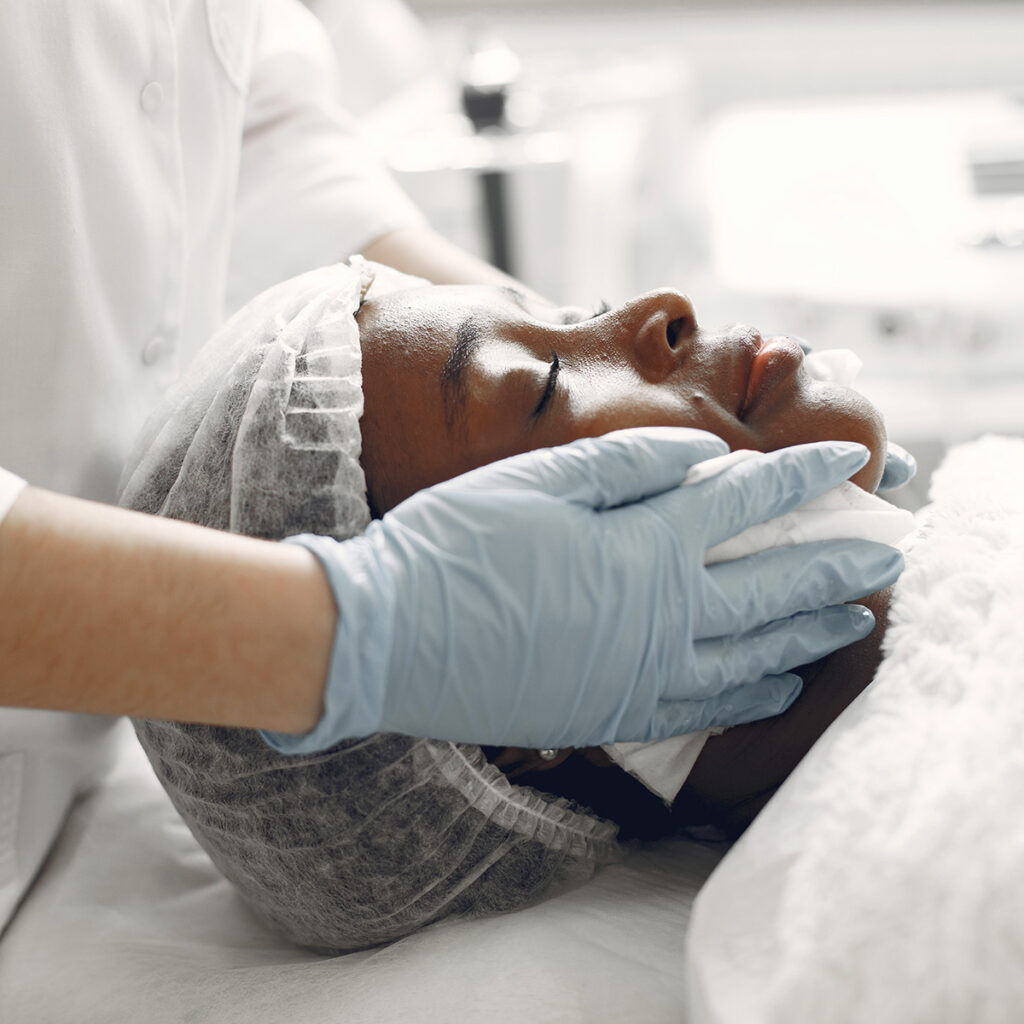 African girl. Woman on couch. Lady at  beautician.